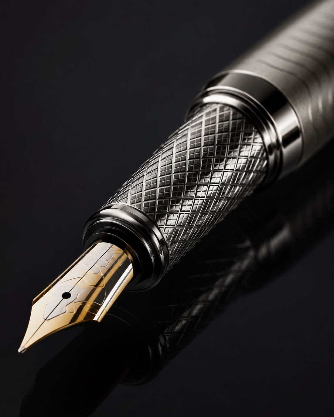 Macro shot of the diamond-knurled grip and gold two-tone nib